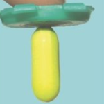 Tablette wird durch Medcoat-Napf gedrückt